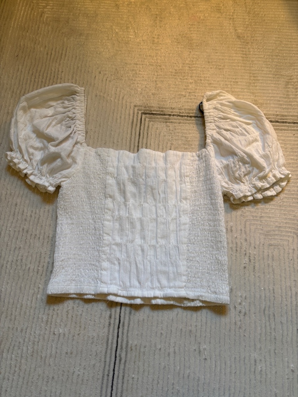 White puffed sleeve top